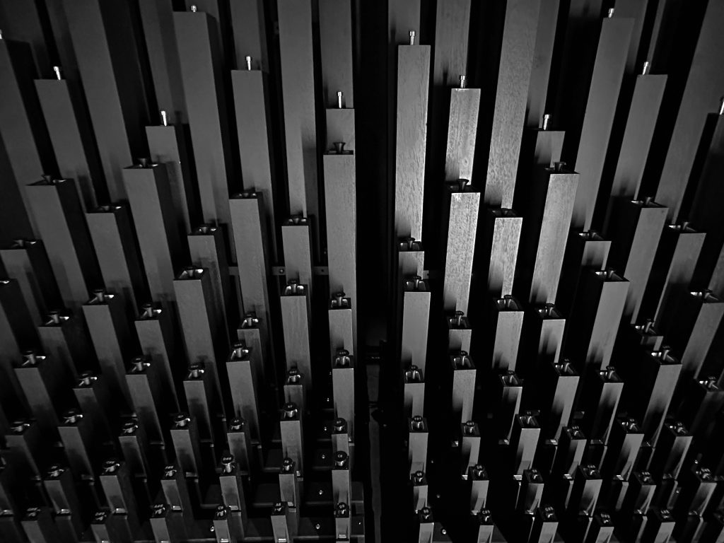 BLACK SQUARE — two stereophonic pipe-organ modules built by Tony Decap for gamut inc, 128 black stopped pipes rising like a skyline